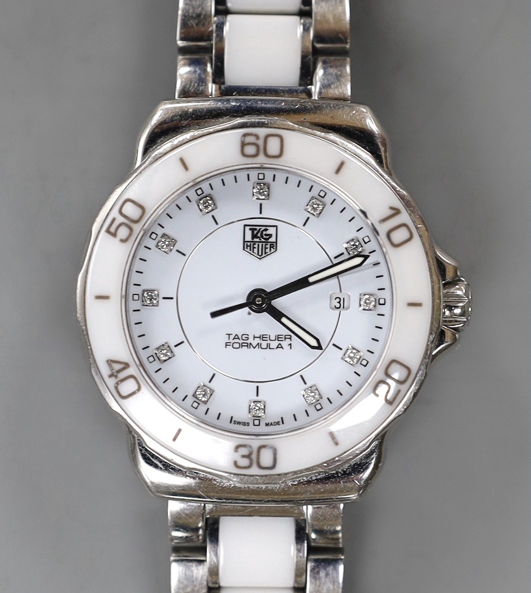 A lady's Tag Heuer Formula One quartz wristwatch (with box and receipt).